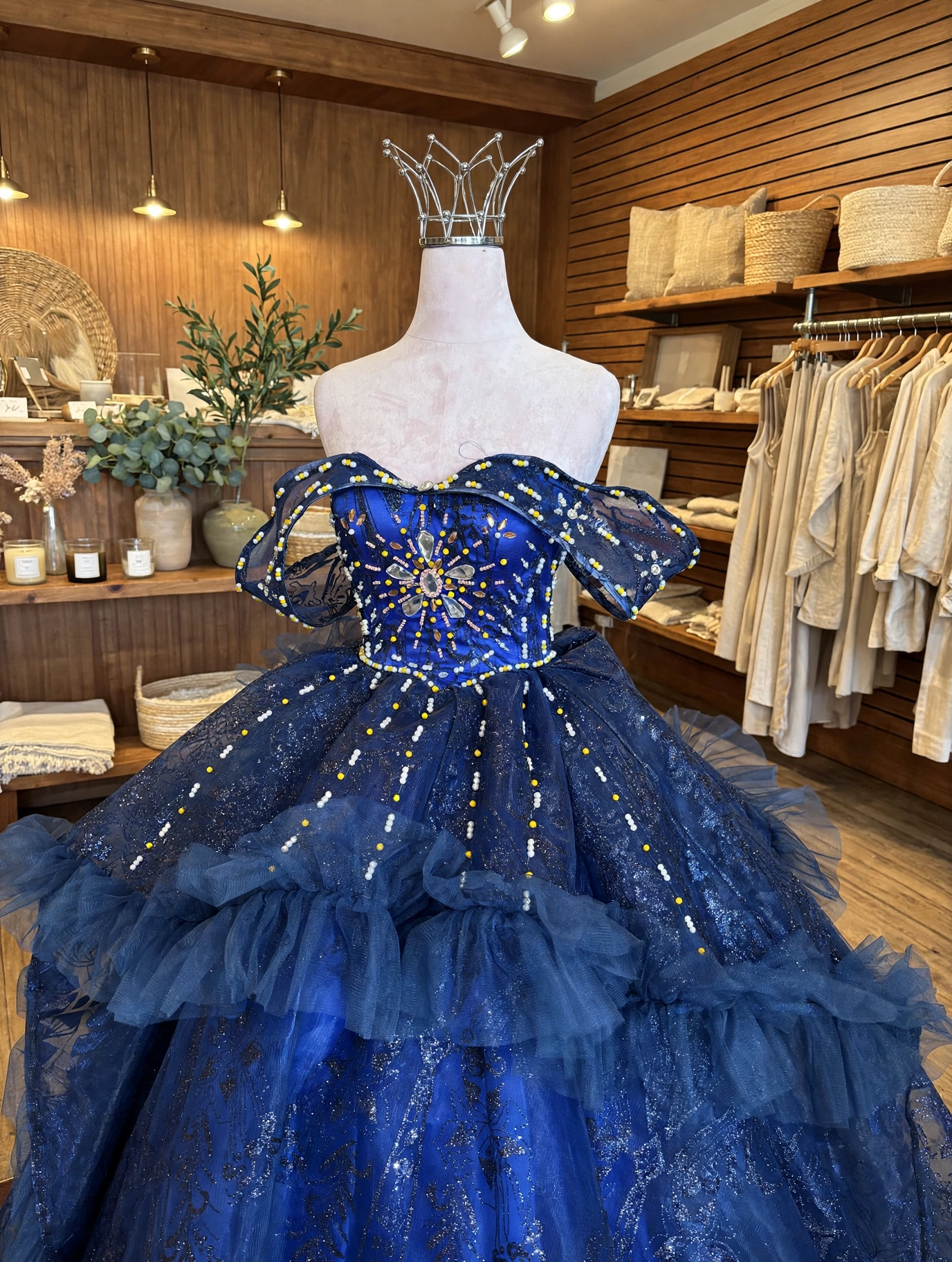 Midnight navy ball gown with layered ruffle skirt, full view