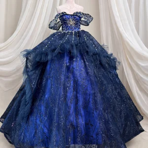 Midnight navy quinceanera dress with gold sunburst beading, front view