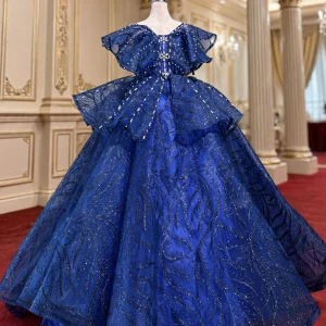Royal blue glitter quinceanera dress with off-the-shoulder ruffles, front view