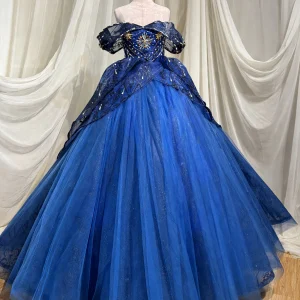 Royal blue quinceanera dress with sunburst beading, front view