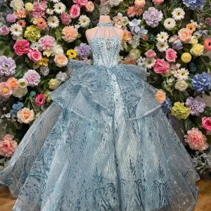 Sky blue halter quinceanera dress with layered ruffle skirt, front view