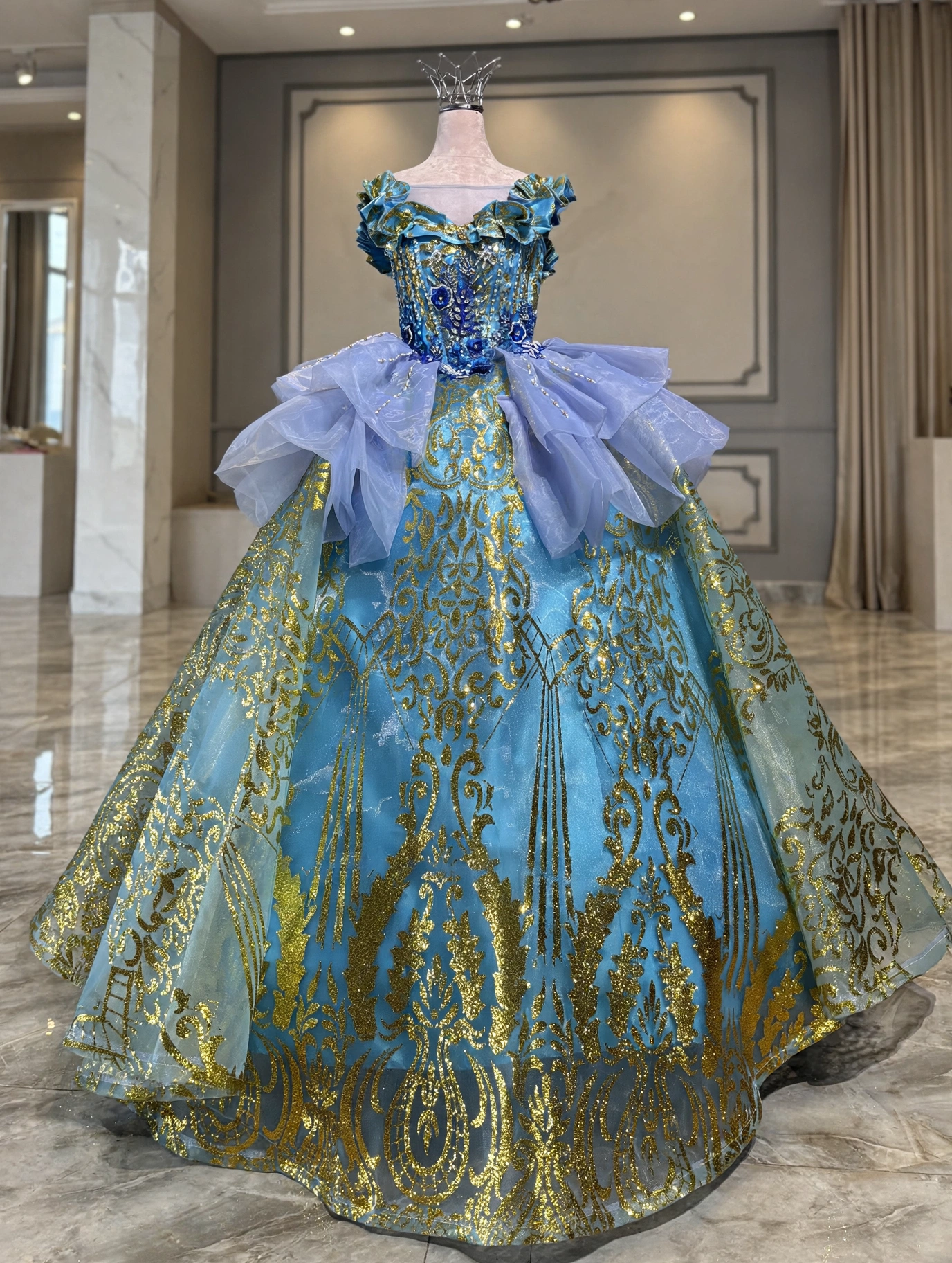 Turquoise ball gown with gold baroque embroidery, side view